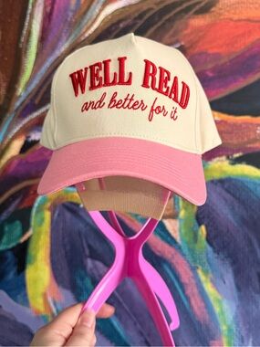 Kirkland’s Pink and Cream 'WELL READ' Trucker Hat Cap
